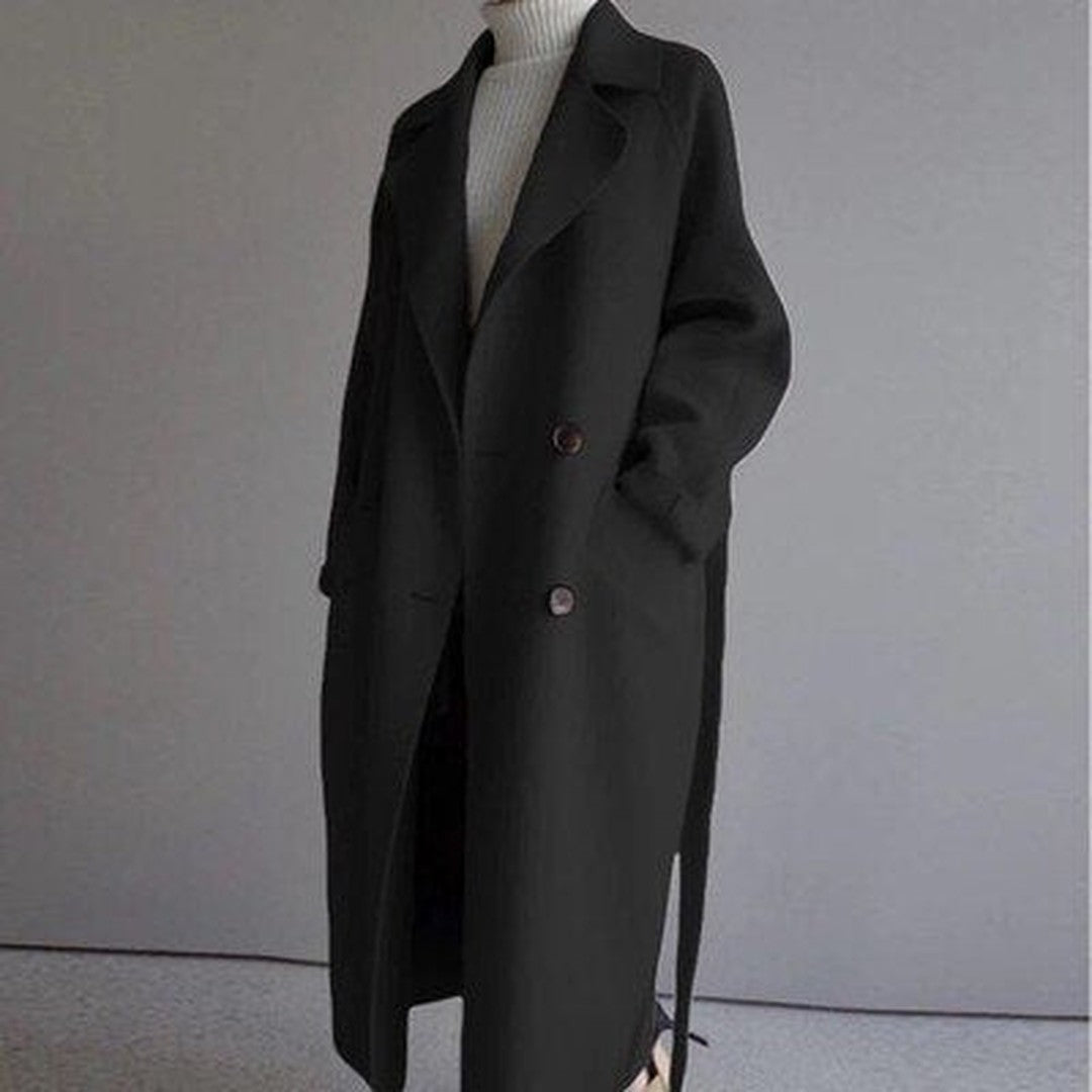 Woman wearing the Arwen women's wool long-sleeve coat, model view
