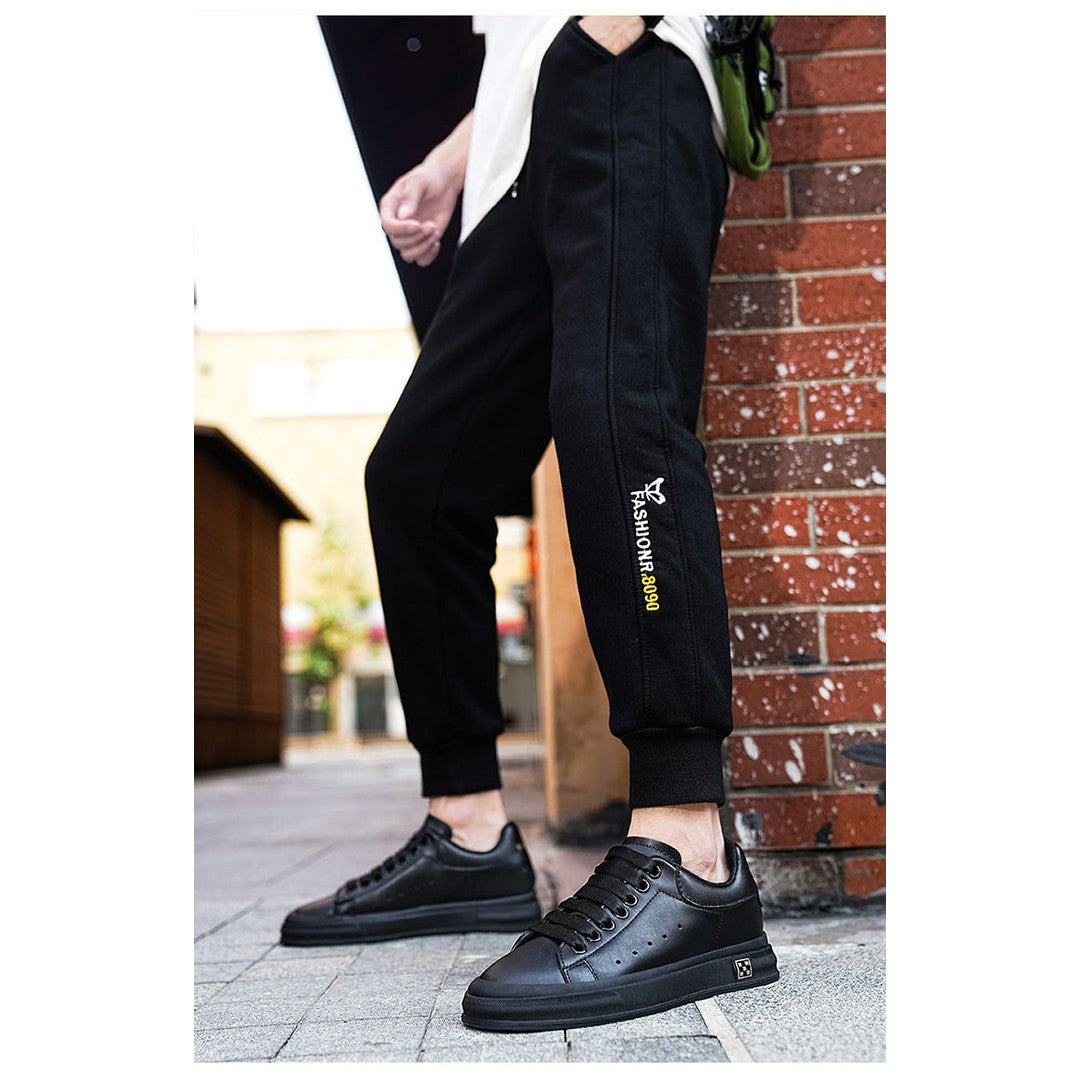 Man wearing the Baird men's sneakers, flatlay view