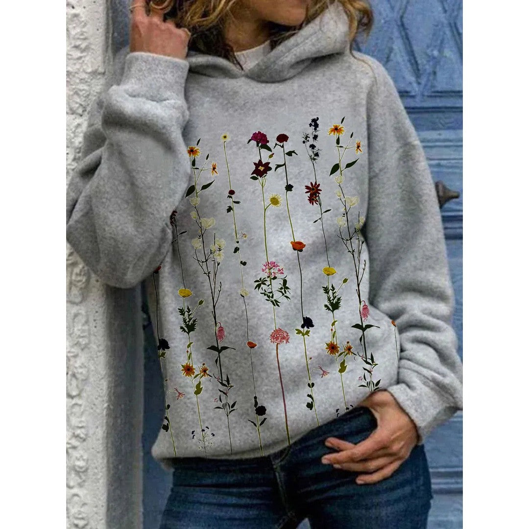 Woman wearing the Blythe women's hoodie, back view