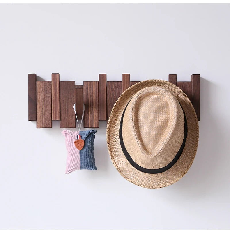 Wooden wall coat rack with fold-away piano key hooks - product photo 3