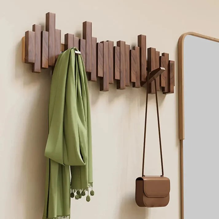 Solid wood wall coat rack with fold-away piano key hooks - product photo 1