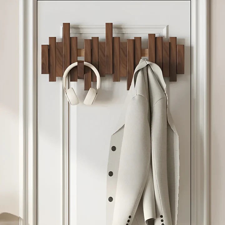 Solid wood wall coat rack with fold-away piano key hooks - product photo 2