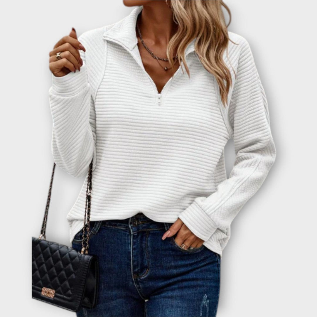 Woman wearing the Claire women's sweater, back view