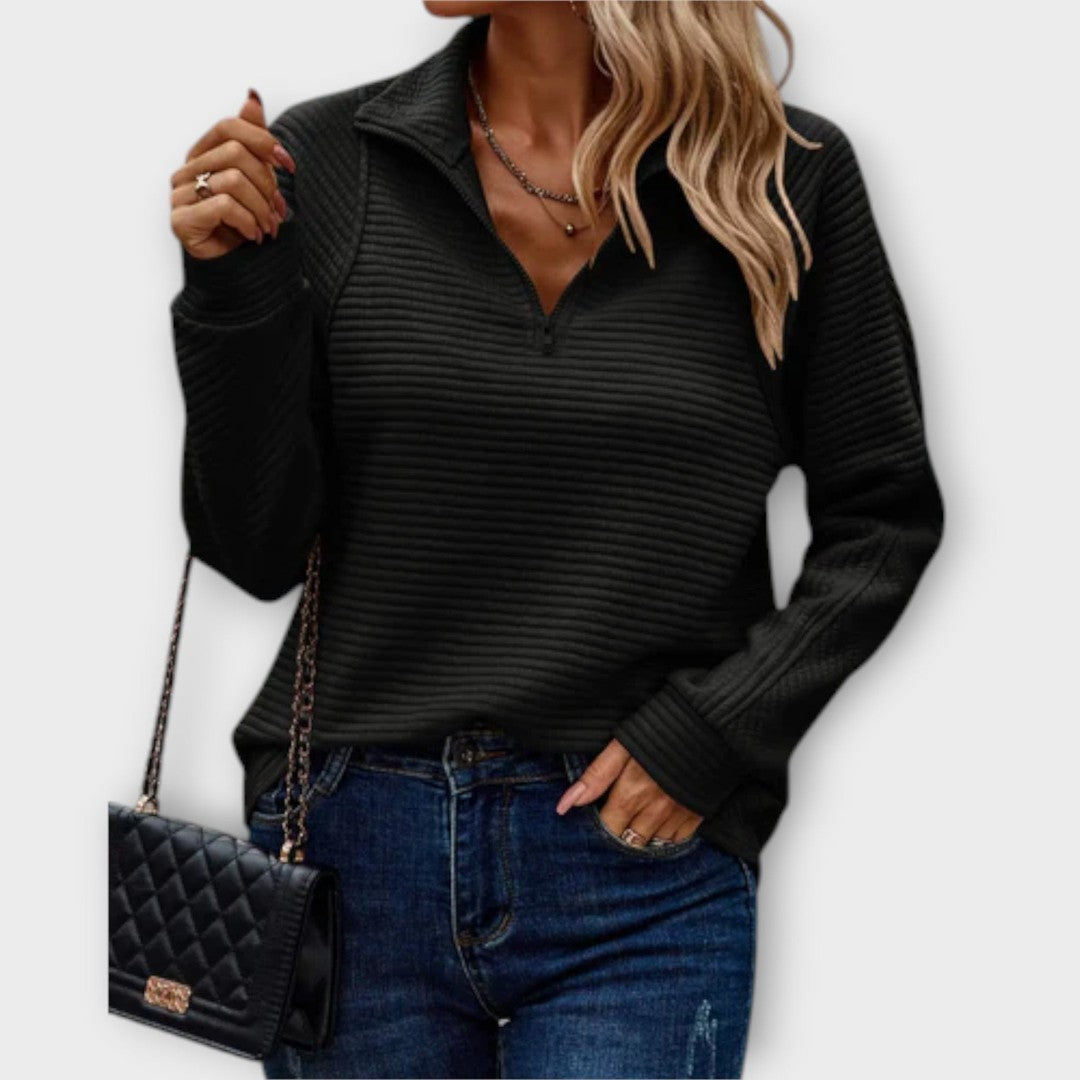 Woman wearing the Claire women's sweater, detail view