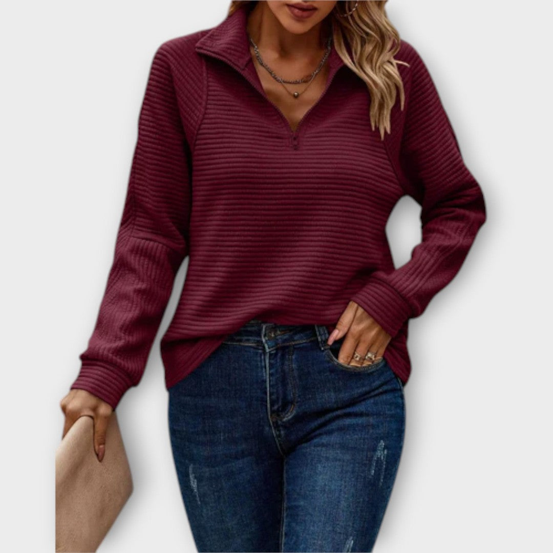 Woman wearing the Claire women's sweater, flatlay view
