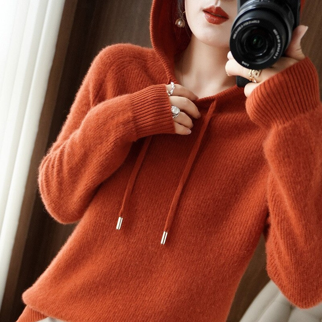 Woman wearing the Cora women's hooded cashmere hoodie, model view