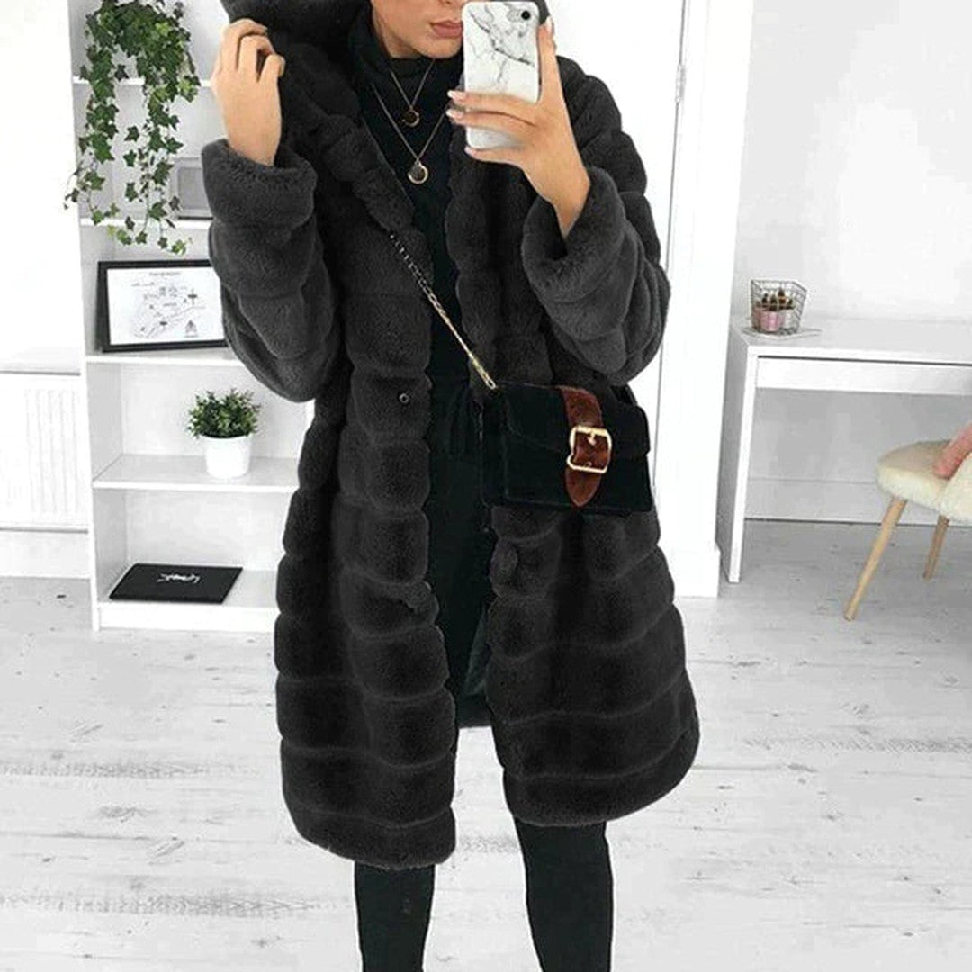 Woman wearing the Dalia women's coat, back view