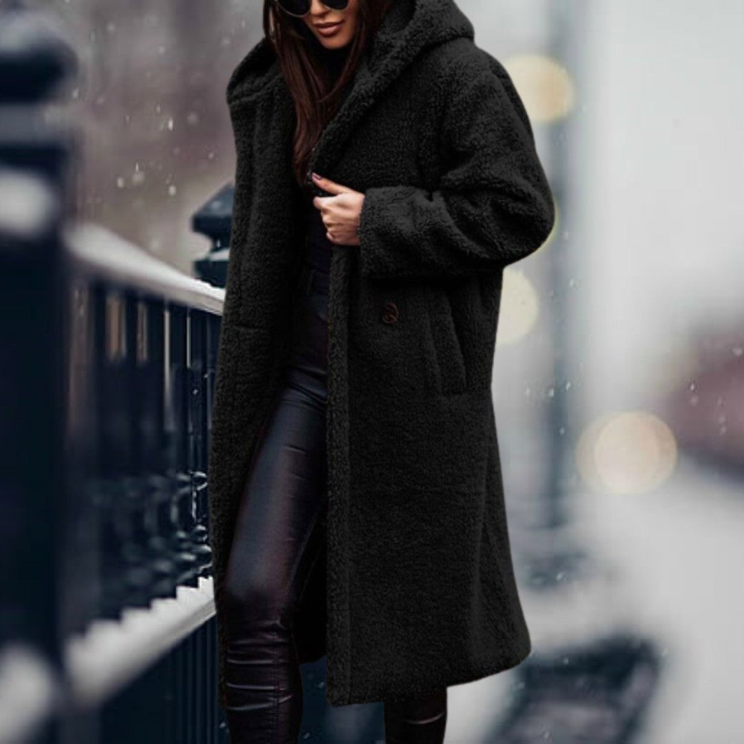 Woman wearing the Delia women's hooded jacket, back view