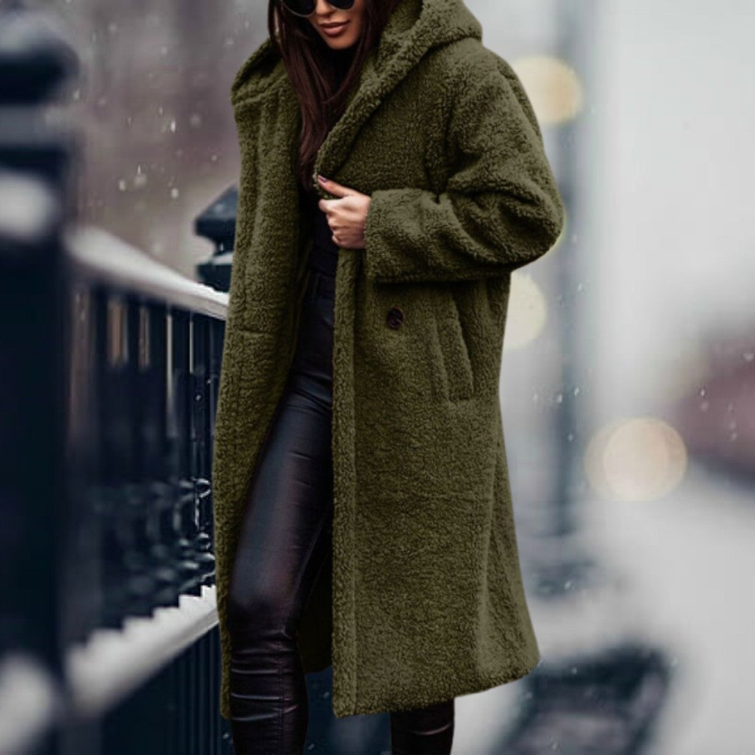 Woman wearing the Delia women's hooded jacket, side view