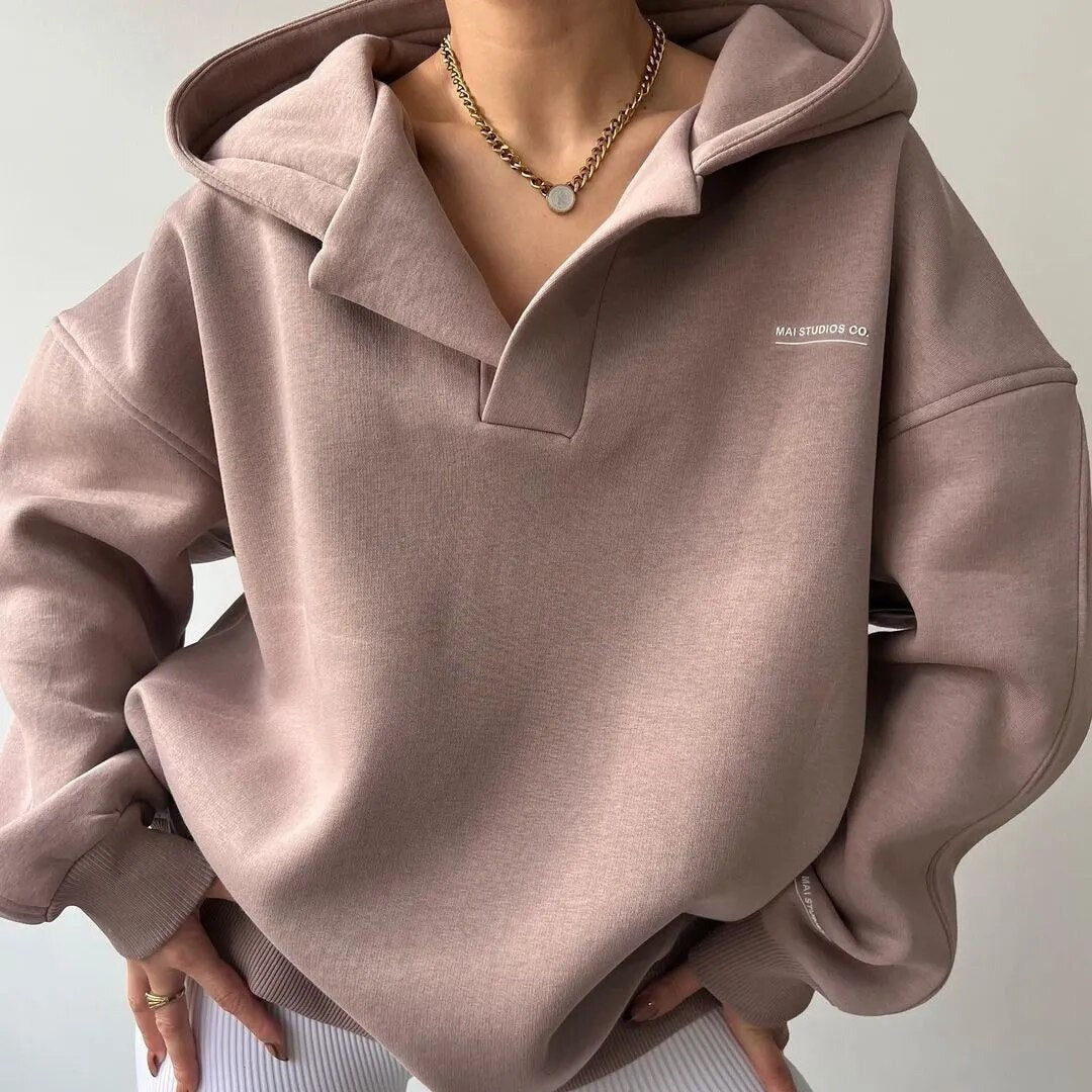 Woman wearing the Delphine women's sweater, model view