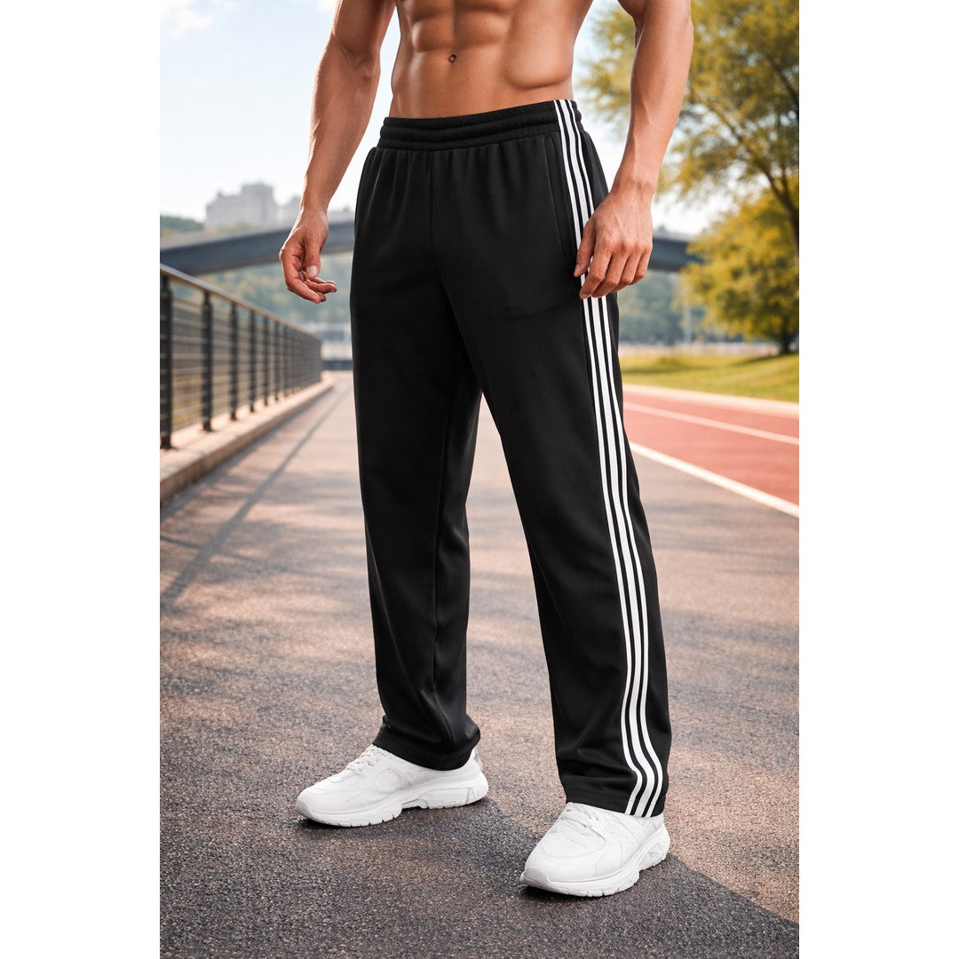 Man wearing the Easton men's denim drawstring pants, back view