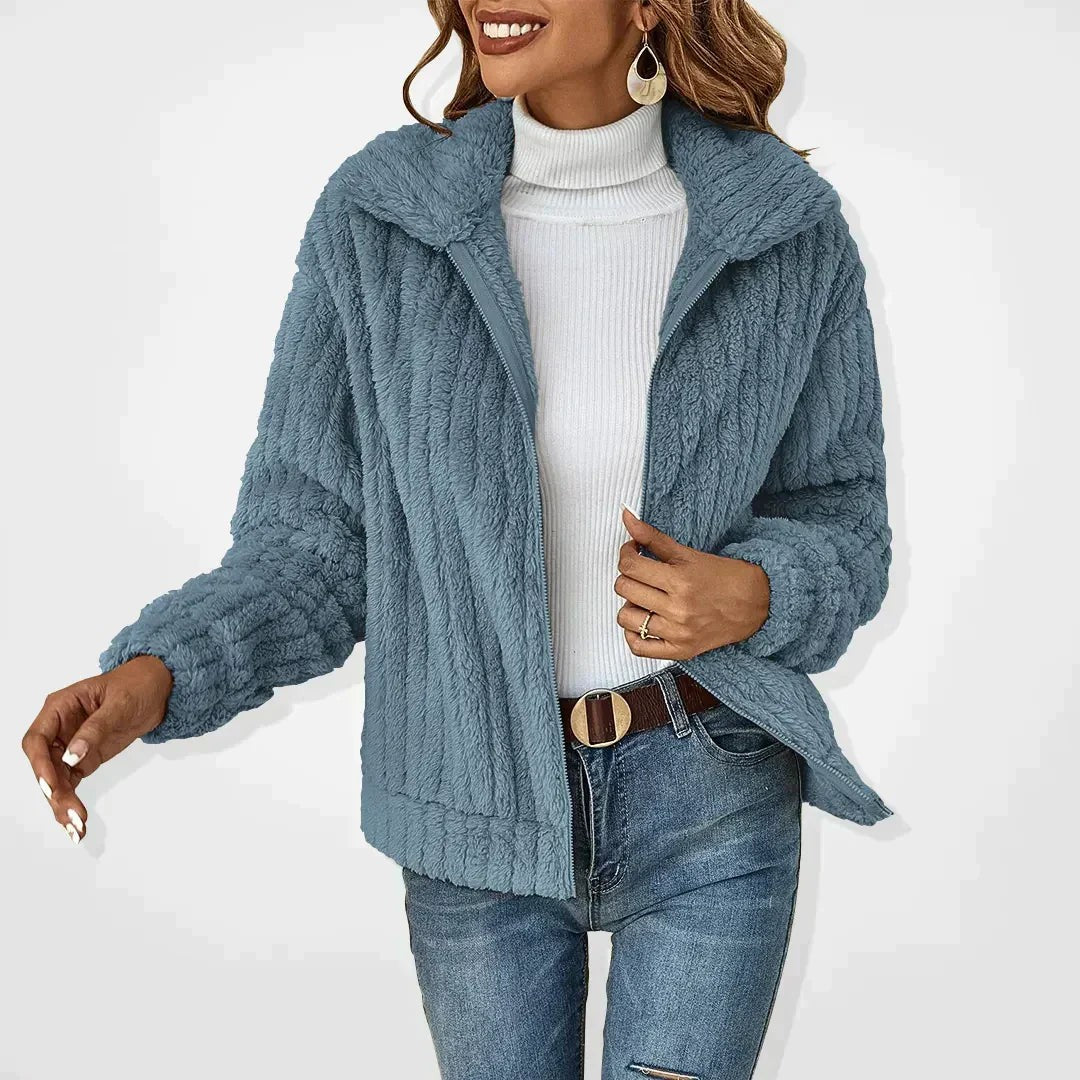 Woman wearing the Eira women's knit cardigan, side view