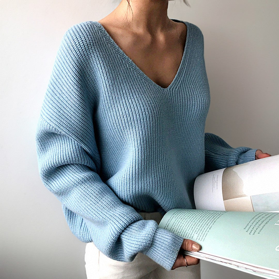 Woman wearing the Elise women's v-neck knit sweater, detail view