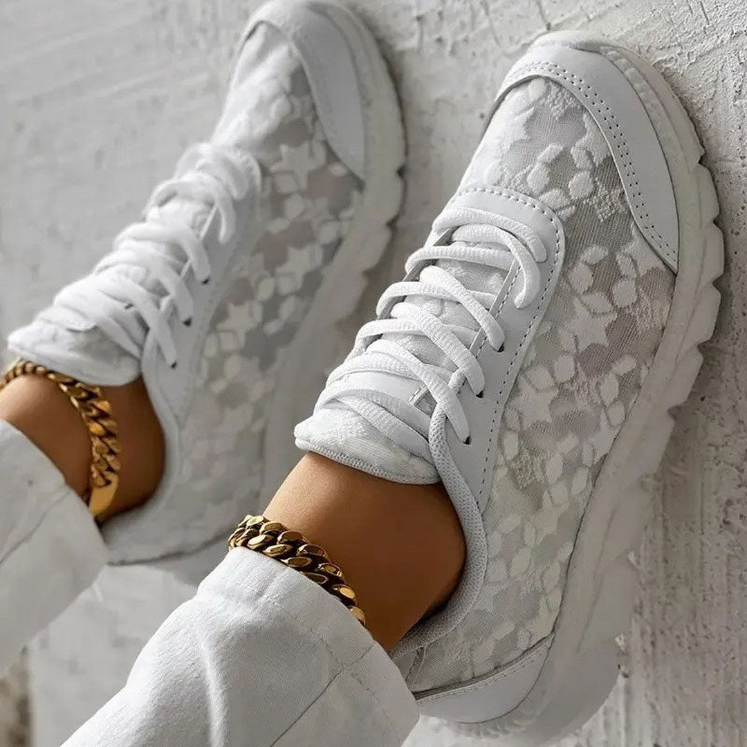 Woman wearing the Elodie women's sneakers, model view