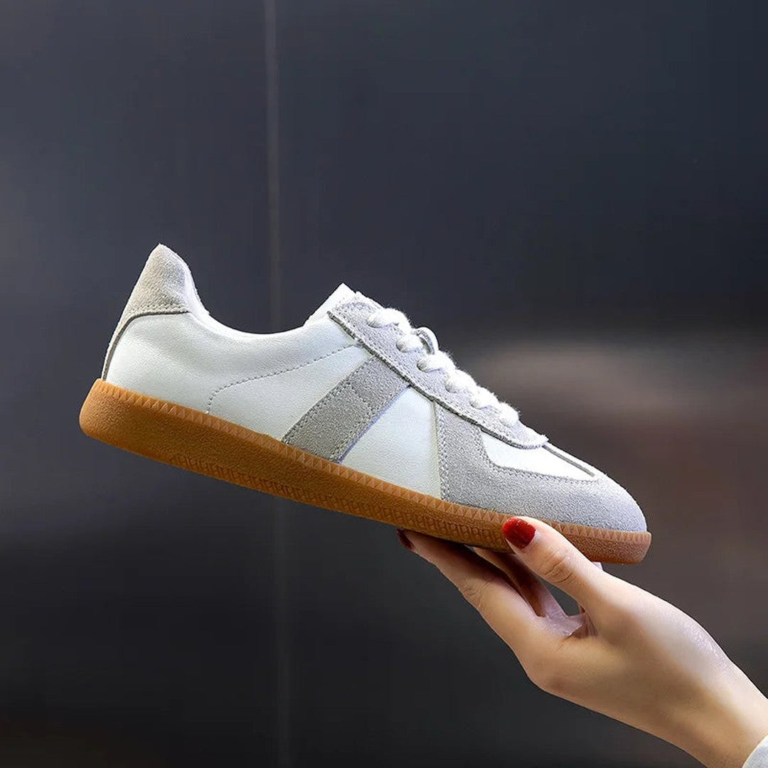 Woman wearing the Ember women's leather shoes, back view