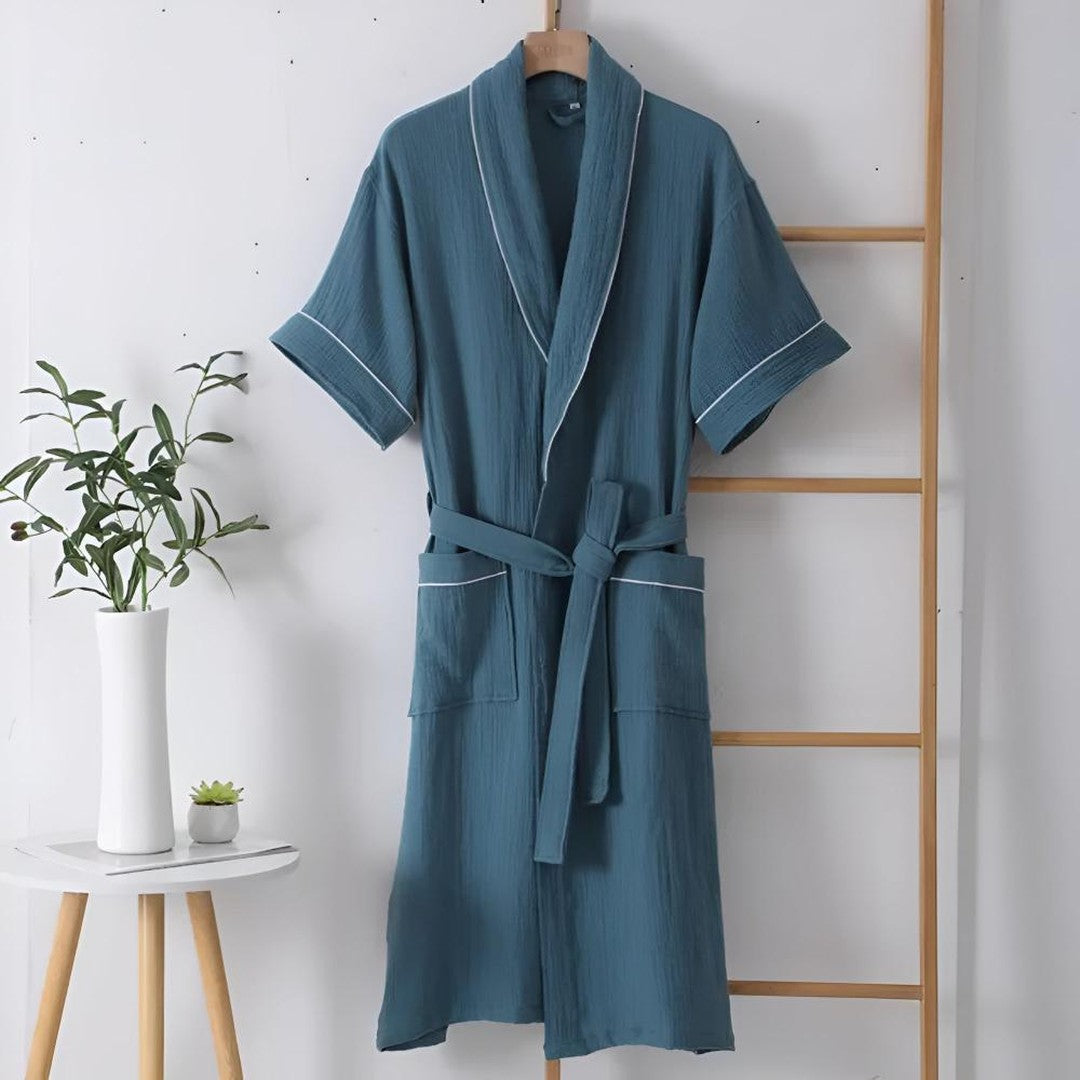 Woman wearing the Esperanza women's cotton long-sleeve bathrobe, front view