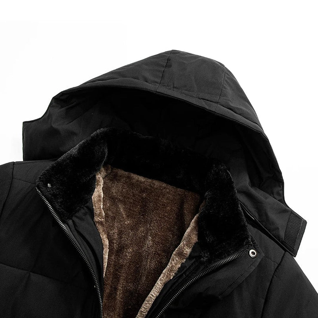 Man wearing the Everett men's jacket in black, back view