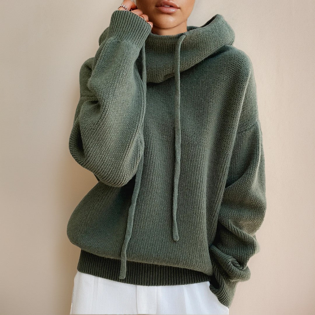 Woman wearing the Farrah women's oversized mock-neck knit sweater, model view