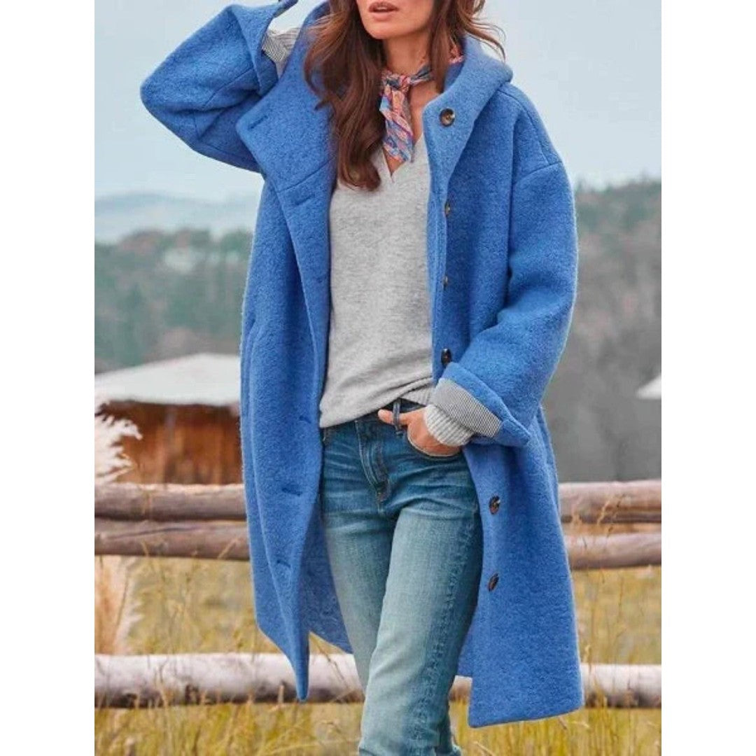 Woman wearing the Freya women's hooded coat, detail view