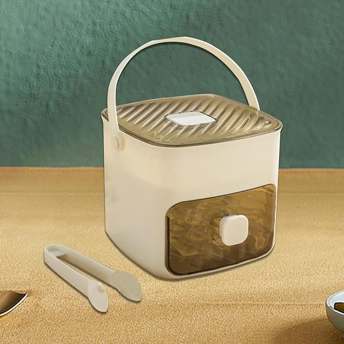 Push-release ice cube box with sealed storage bin - product photo 1