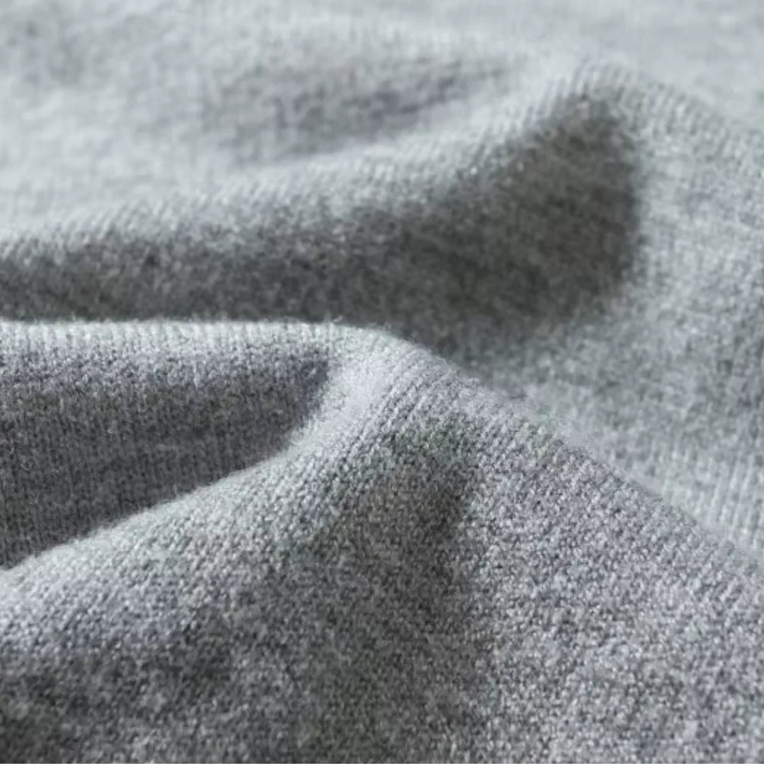 Man wearing the Gael men's v-neck knit long-sleeve sweater, back view