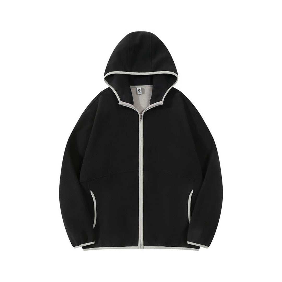 Woman wearing the Gaia women's relaxed hooded jacket, flatlay view