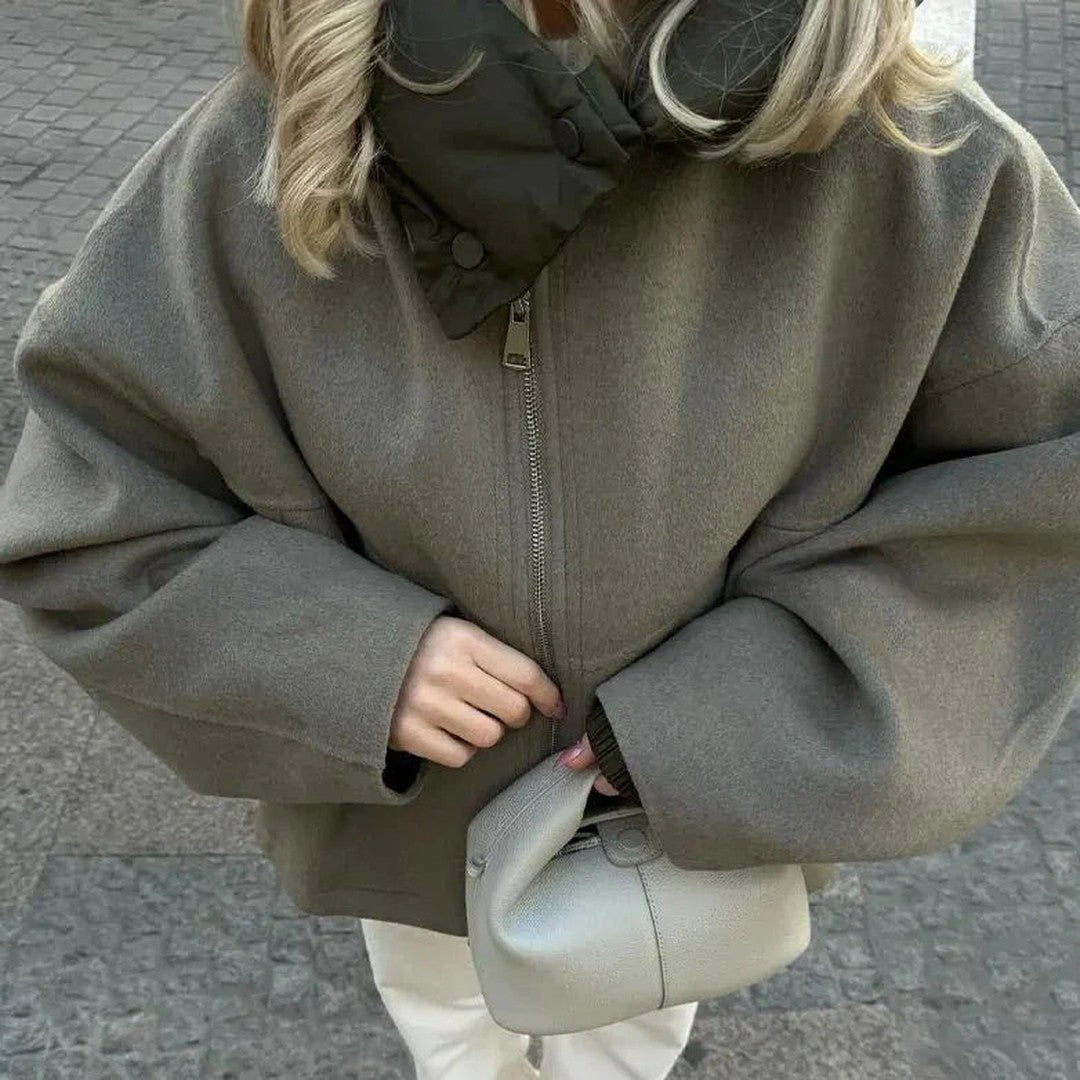 Woman wearing the Gaia women's relaxed hooded jacket, model view