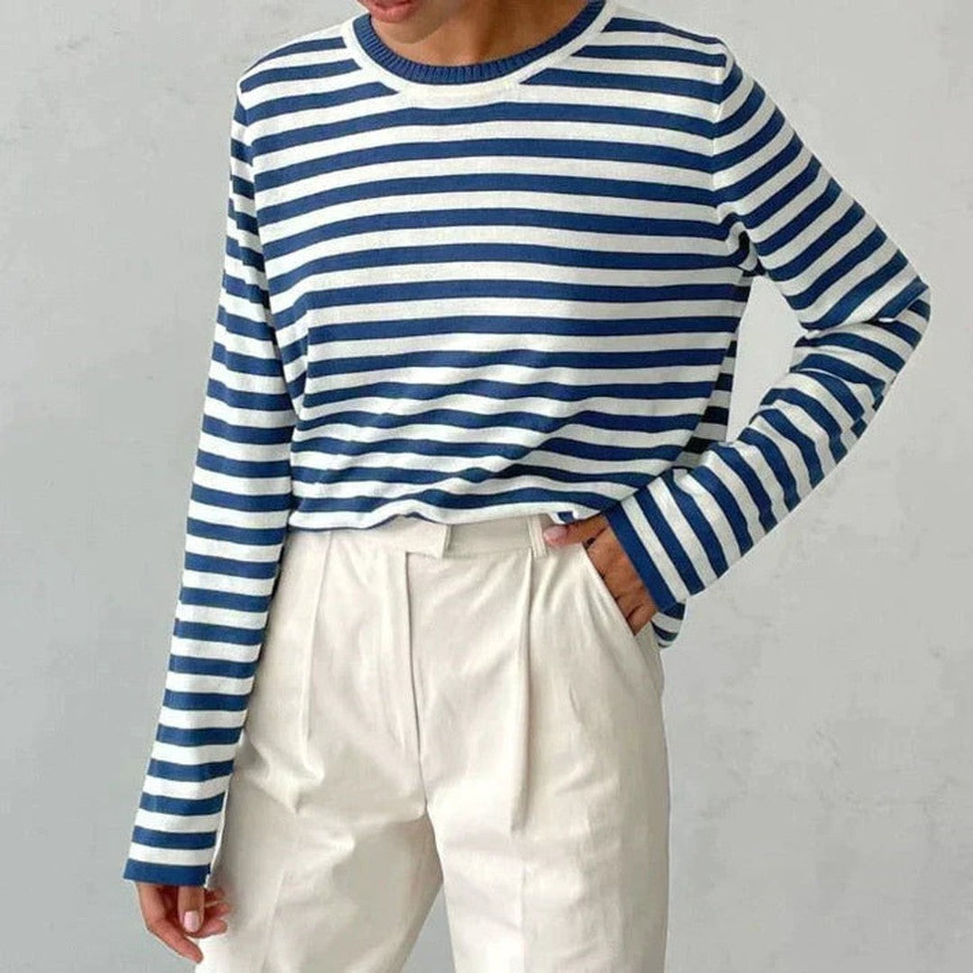 Woman wearing the Georgia women's striped shirt, flatlay view