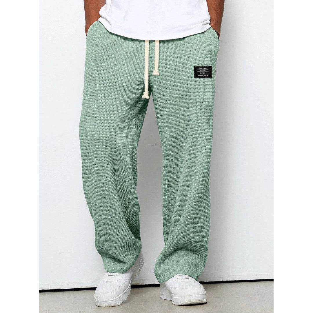 Man wearing the Gerard men's relaxed denim breathable pants, model view