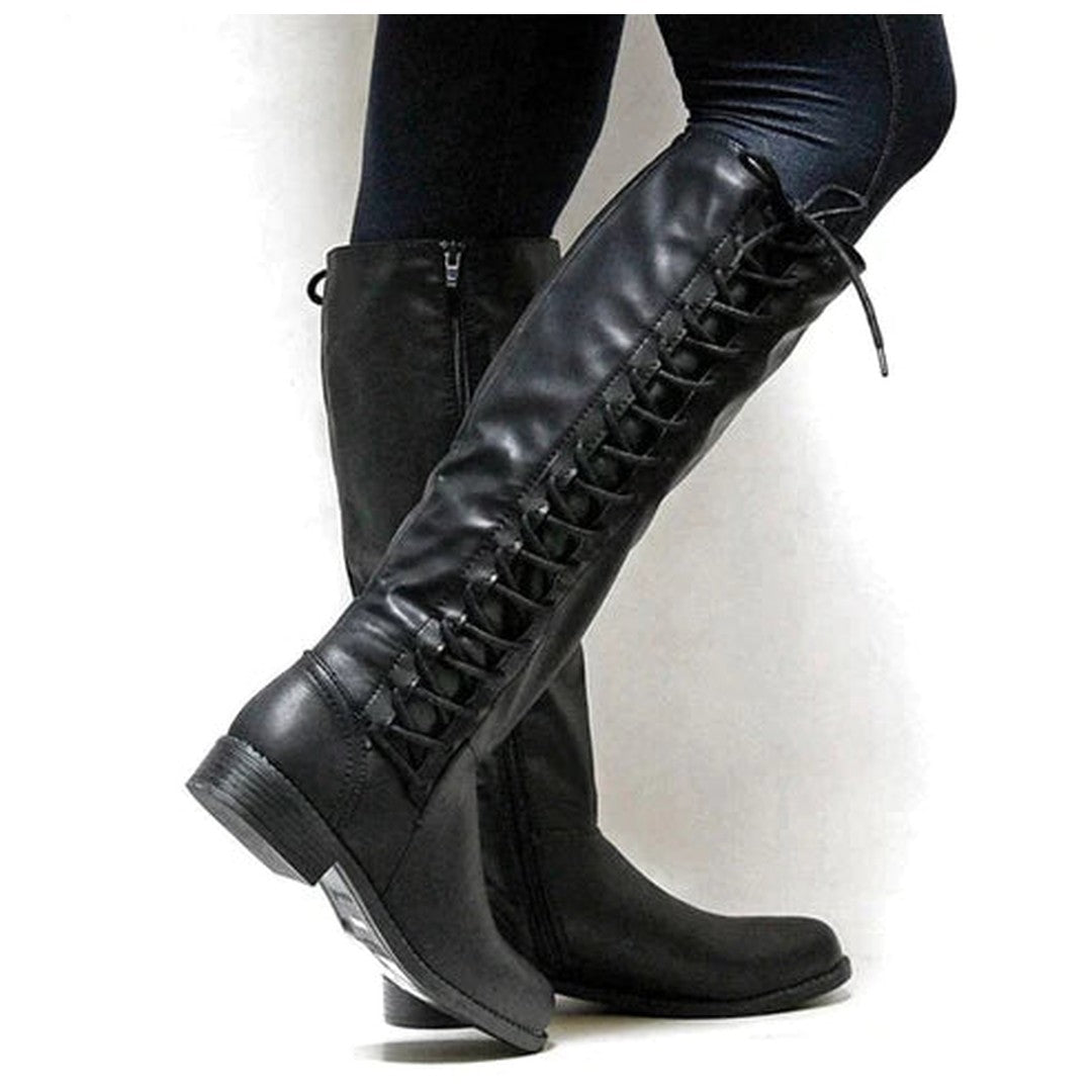 Woman wearing the Greer women's elegant boots, front view