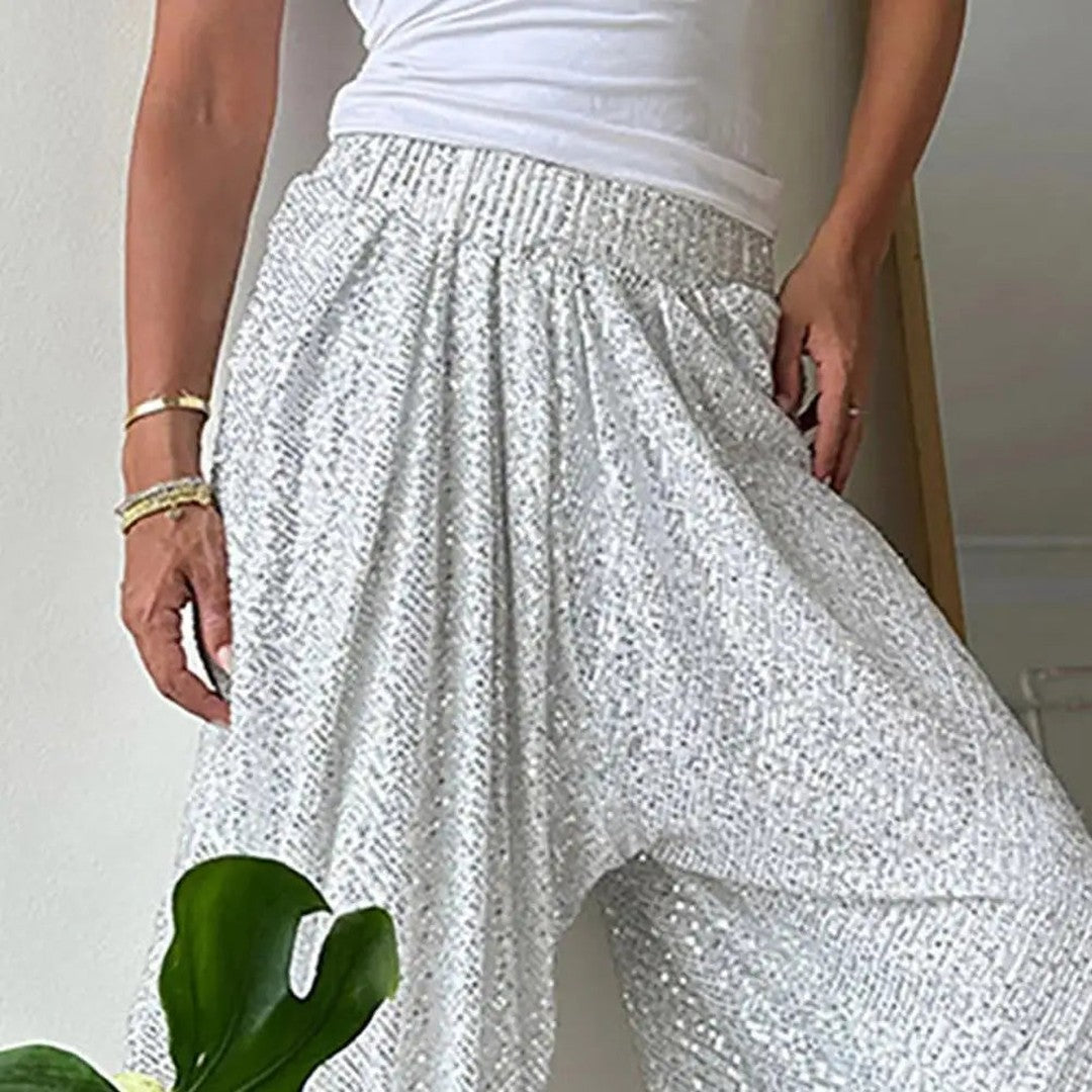 Woman wearing the Halcyon women's joggers, flatlay view