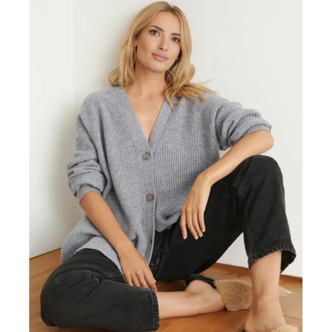 Woman wearing the Helena women's knit sweater, side view