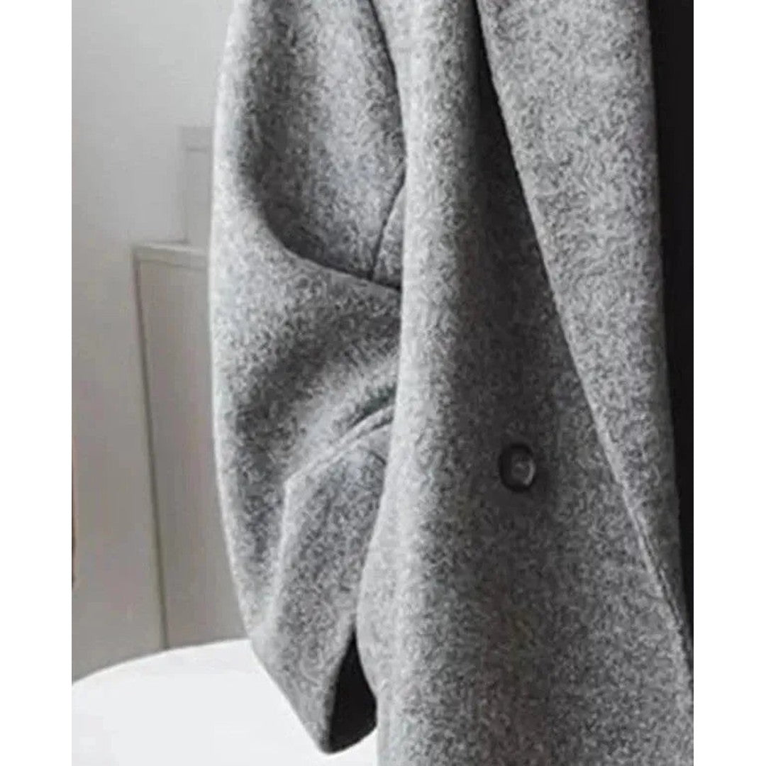 Woman wearing the Ilse women's coat, side view