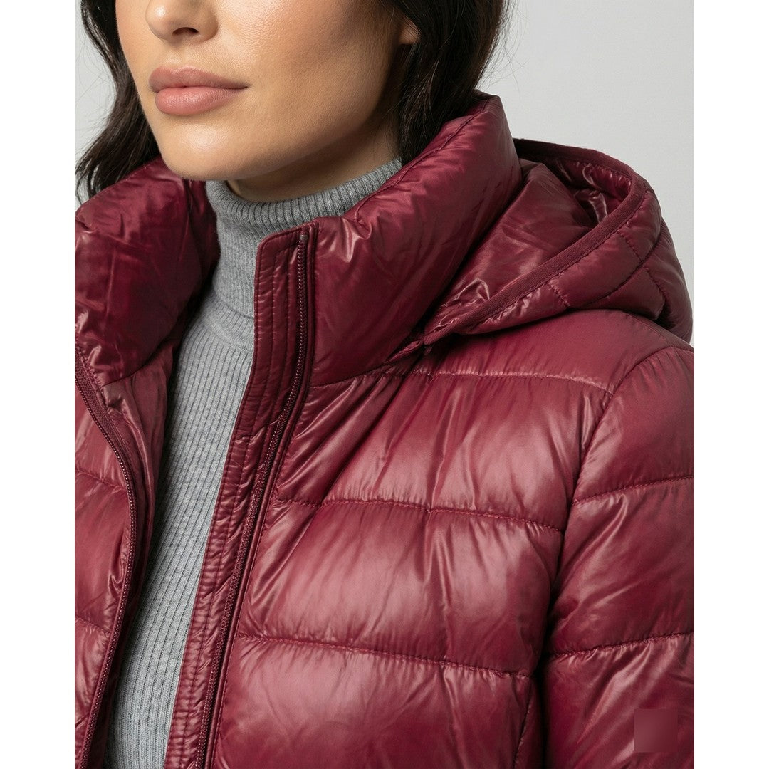 Woman wearing the Isla women's hooded jacket, back view