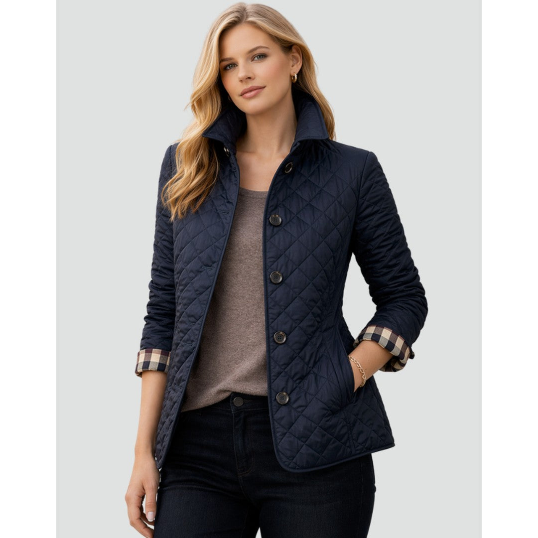 Woman wearing the Junia women's quilted coat, model view