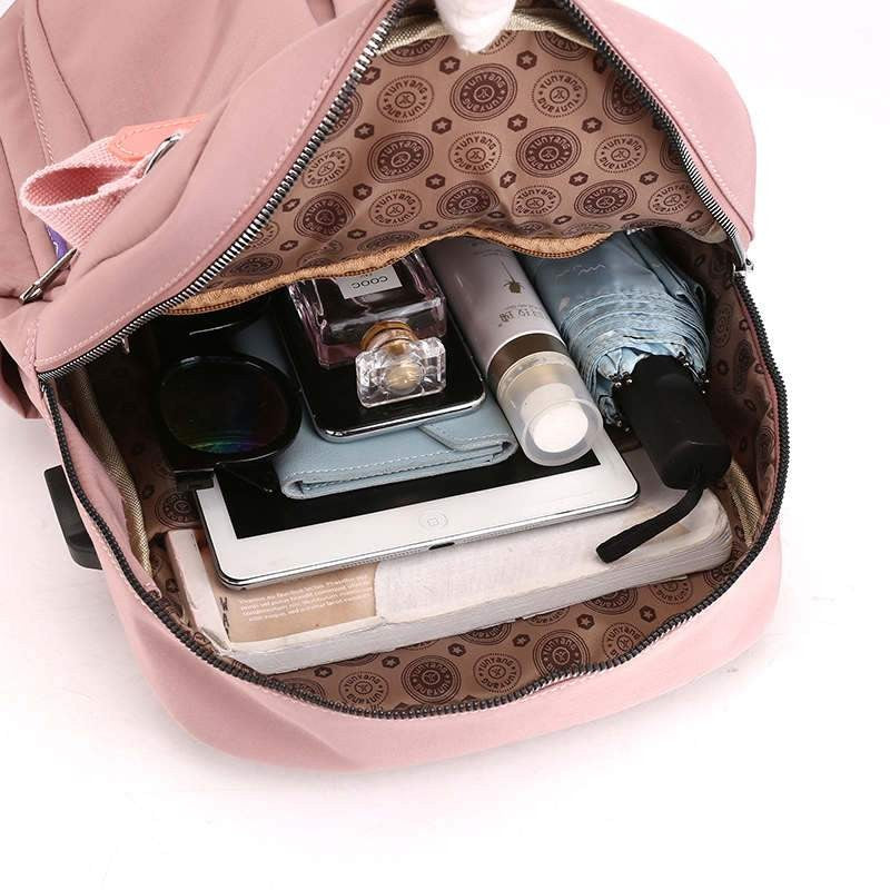 Water-resistant anti-theft backpack with a USB charging port - product photo 9