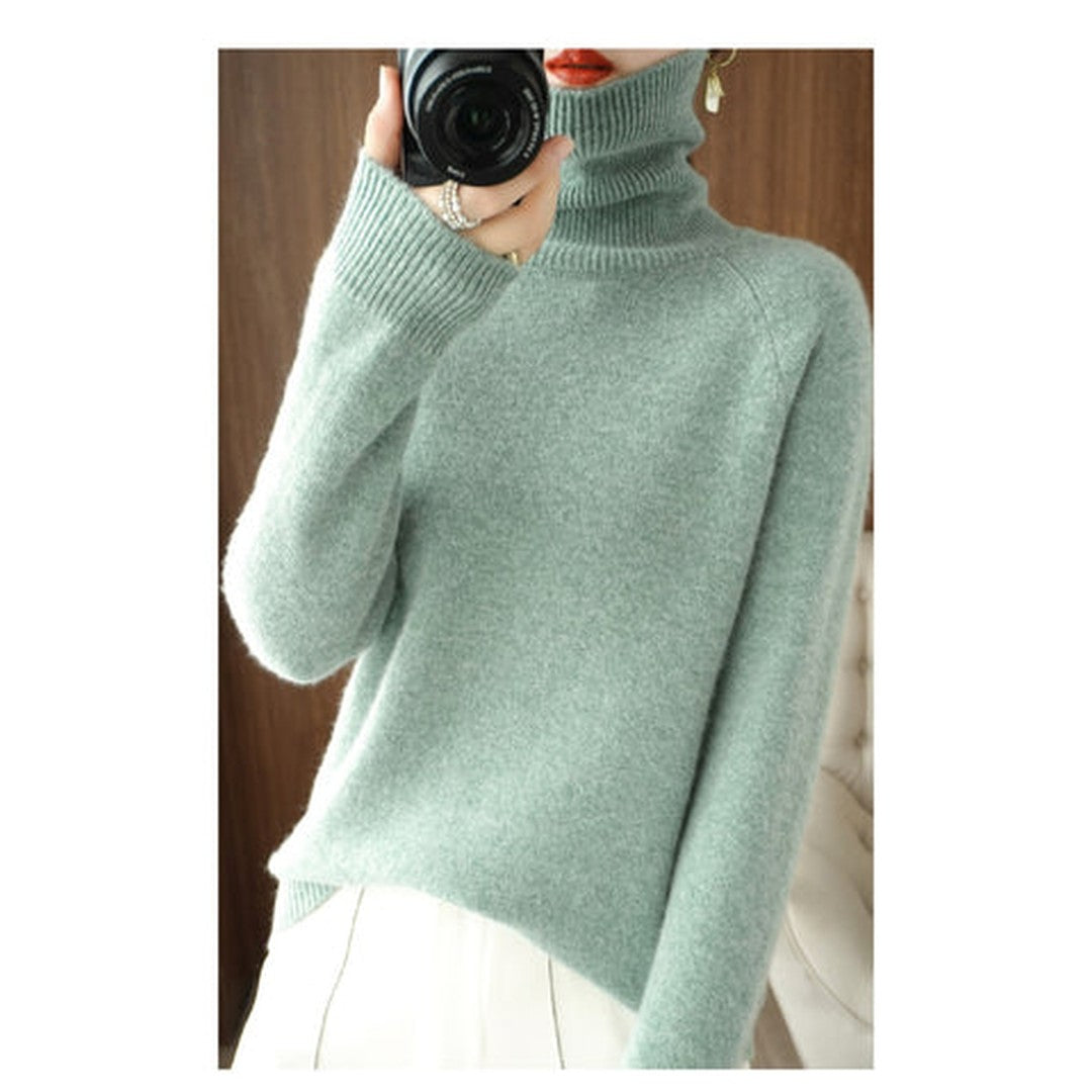 Woman wearing the Lark women's knit sweater, front view