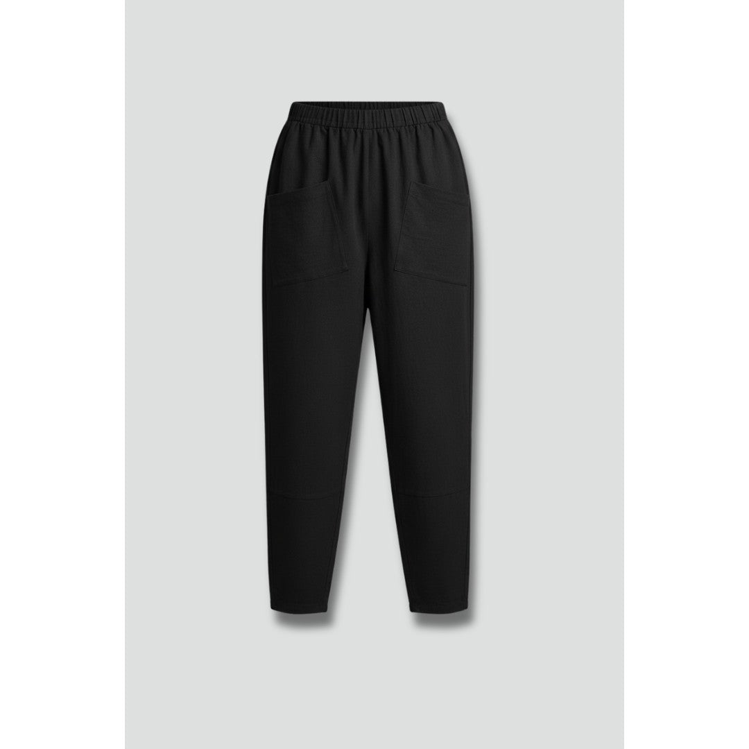 Woman wearing the Lilith women's pocket detail pants, front view