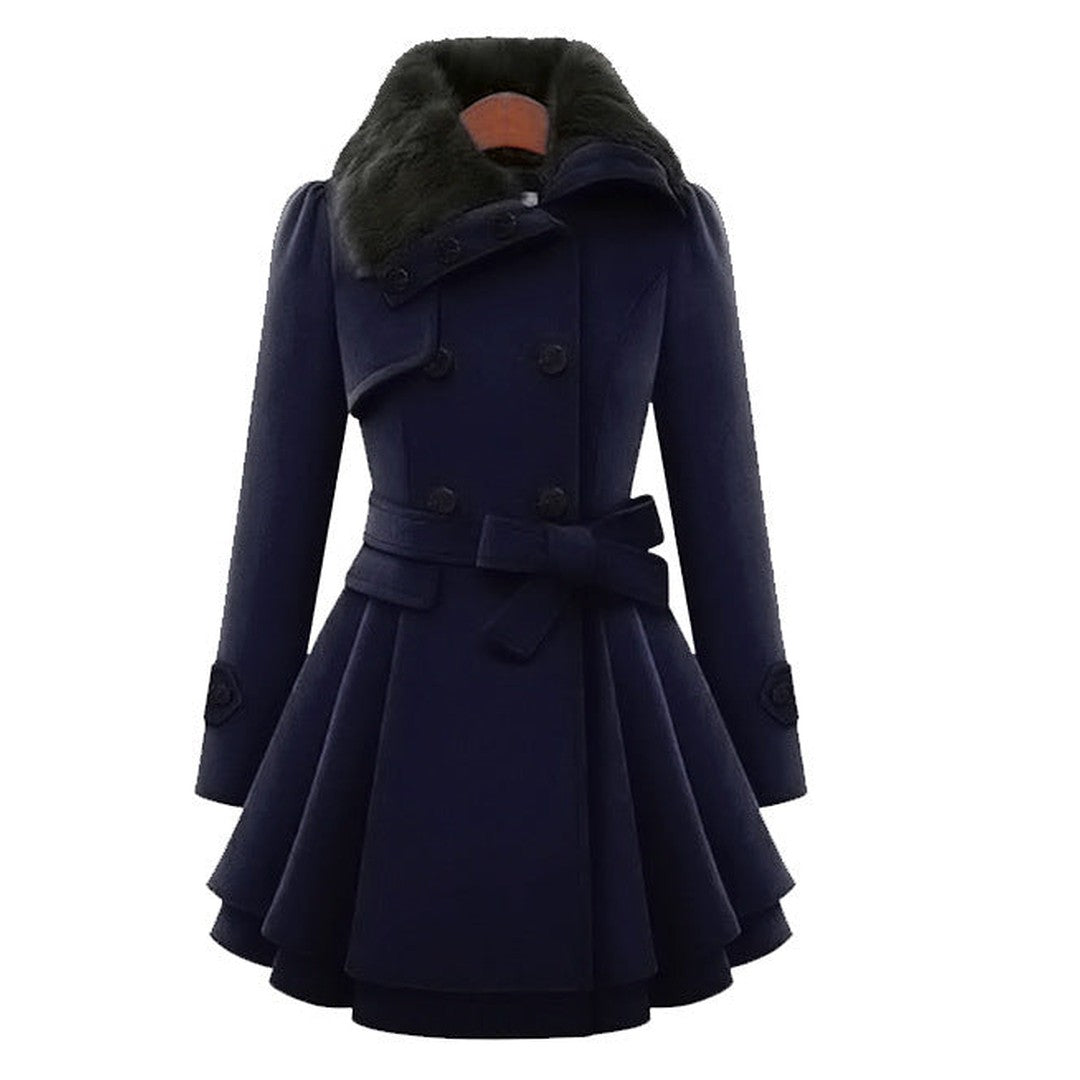 Woman wearing the Lily women's vintage trench coat, model view
