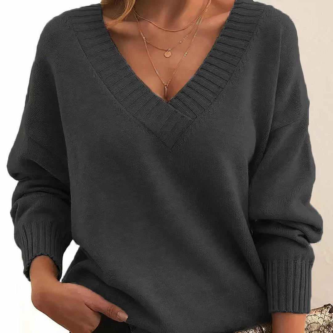 Woman wearing the Mavis women's v-neck long-sleeve sweater, detail view