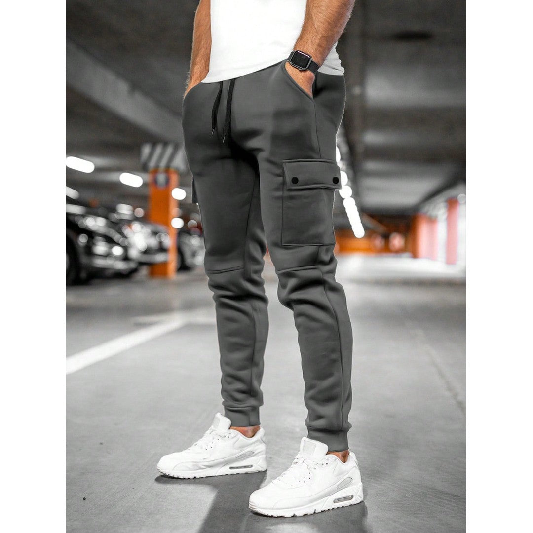 Man wearing the Nolan men's roll-up joggers, front view
