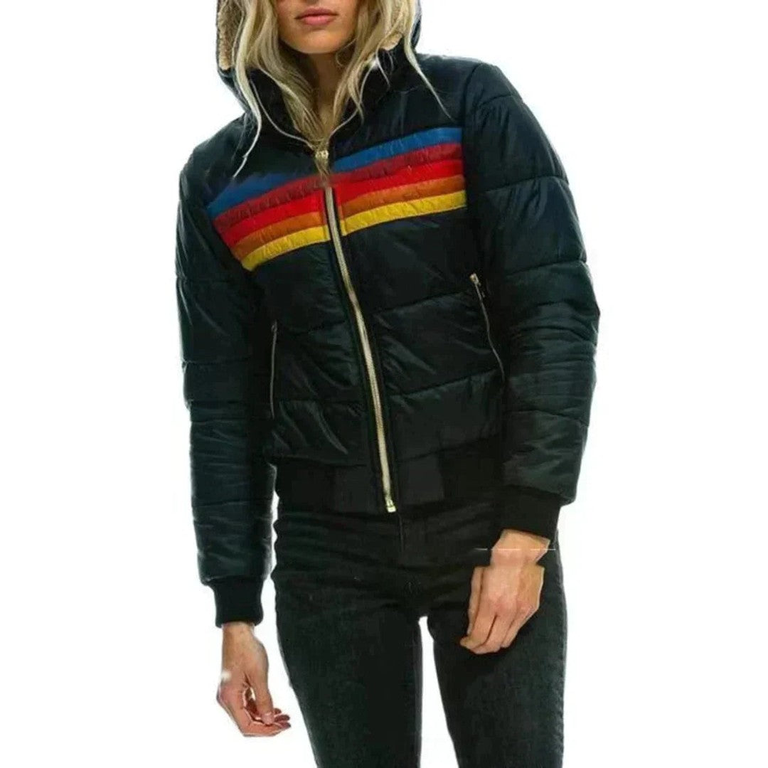Woman wearing the Noor women's jacket, side view