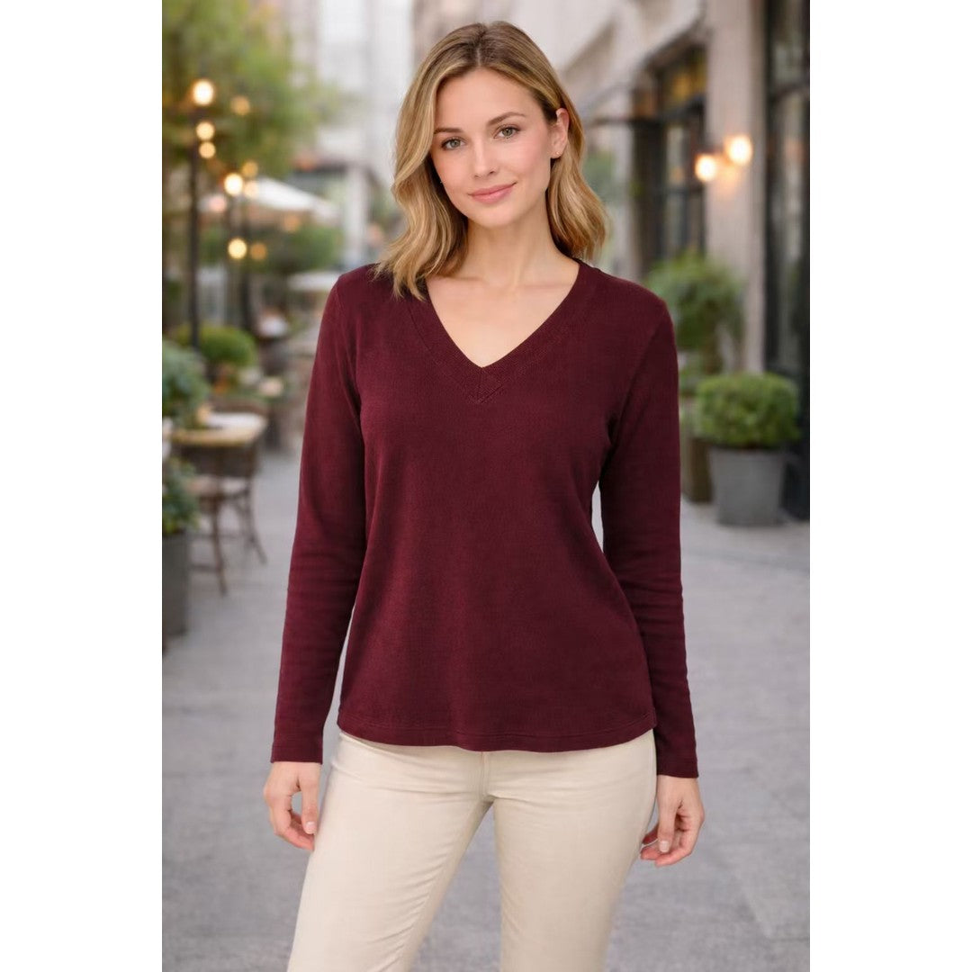 Woman wearing the Norah women's v-neck knit vintage sweater, 9 view