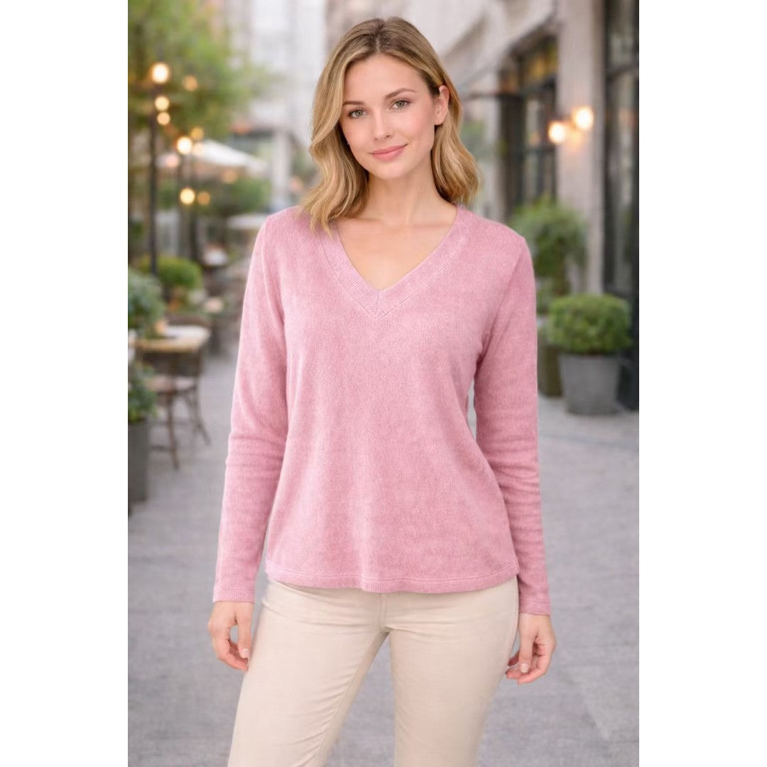 Woman wearing the Norah women's v-neck knit vintage sweater, model view