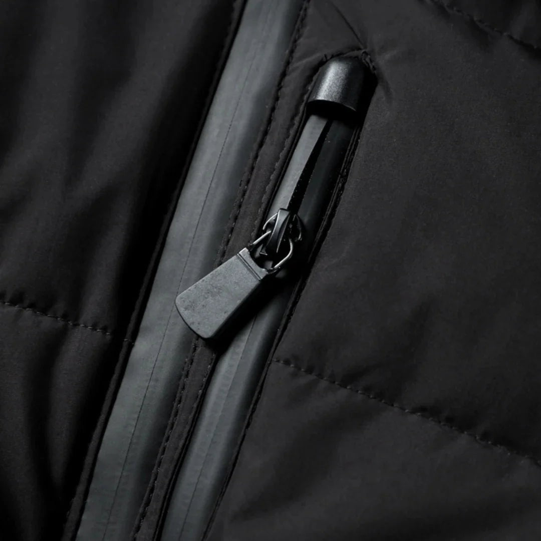 Woman wearing the Paloma women's hooded quilted jacket in black, model view