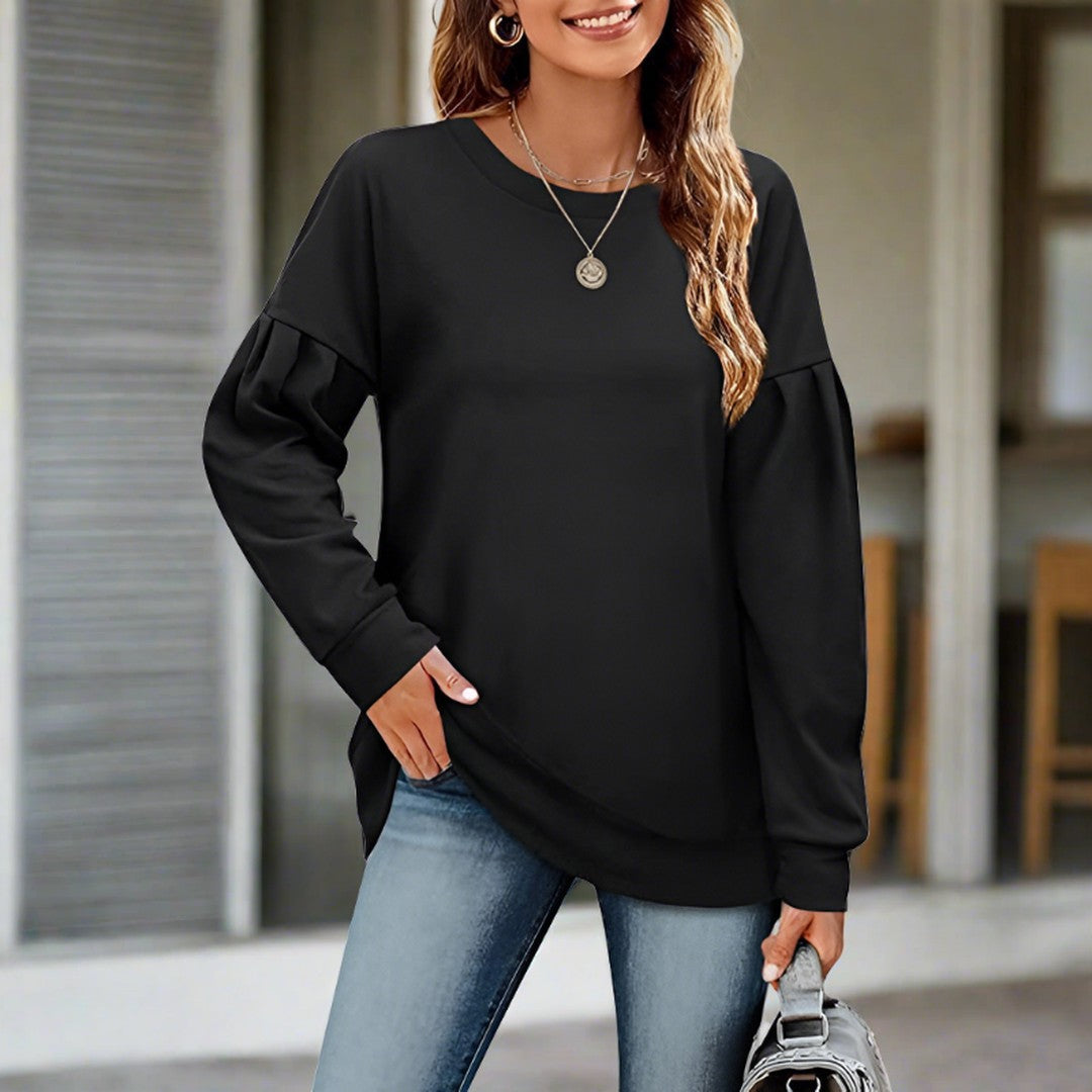 Woman wearing the Petra women's sweatshirt, front view