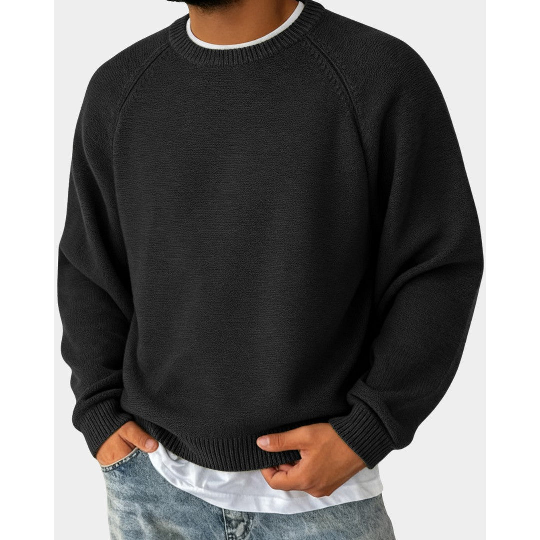 Man wearing the Preston men's crewneck sweater, side view