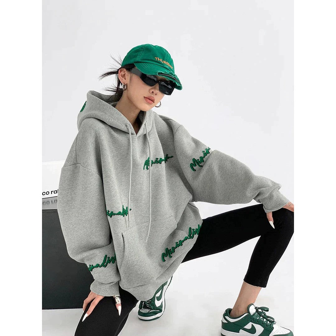 Woman wearing the Romilly women's hoodie, front view