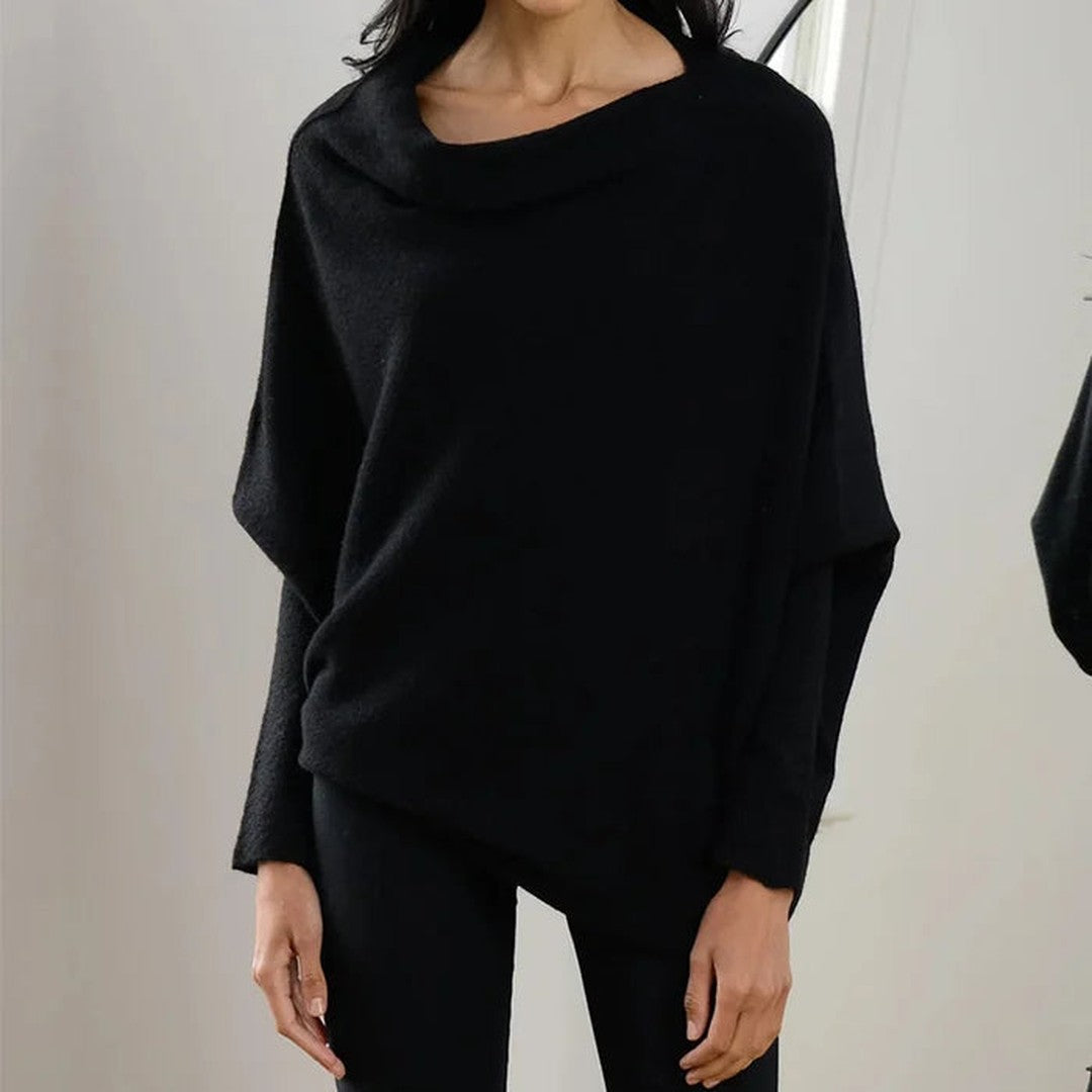 Woman wearing the Romy women's knit sweater, side view