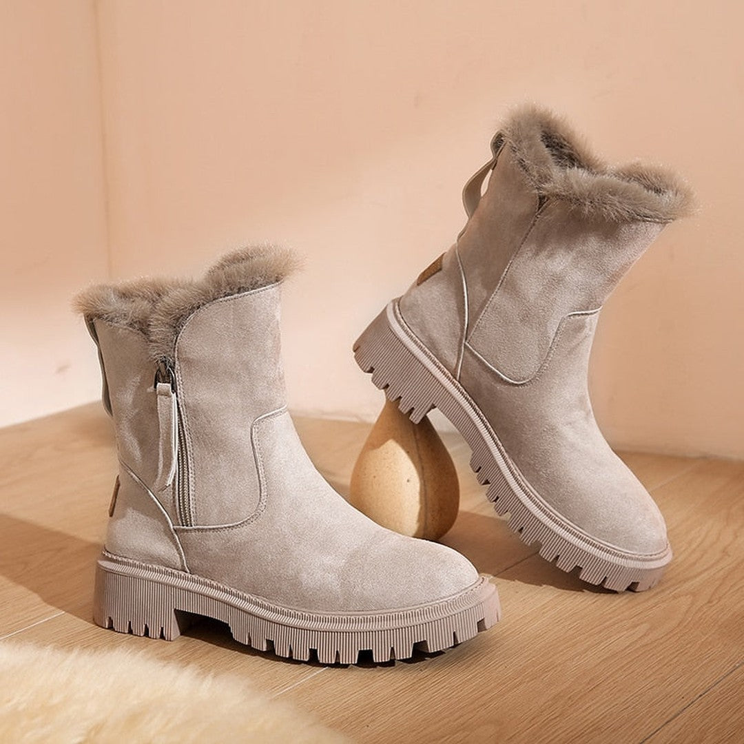 Woman wearing the Rosalie women's boots, flatlay view